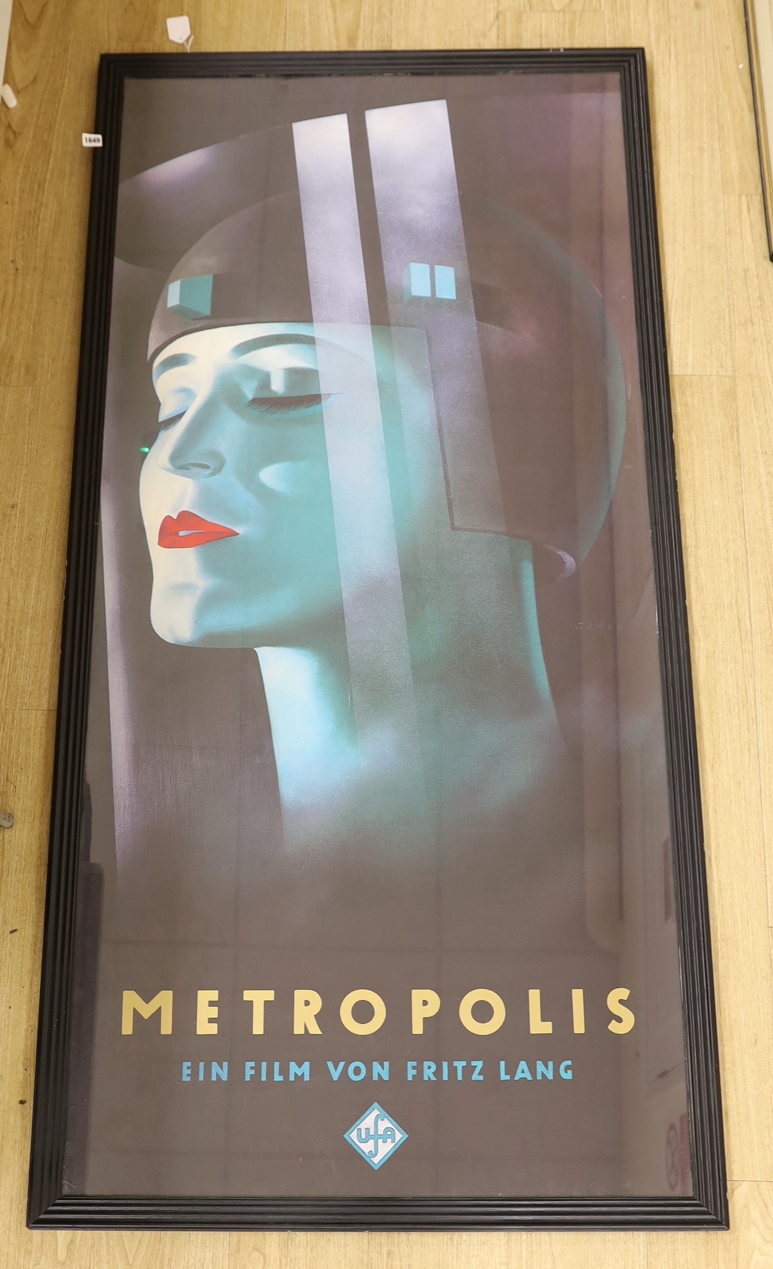 After Werner Graul, colour print, Fil, poster for Metropolis, 179 x 82cm